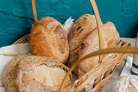 pexels-bruthethe-1755788450x300 Basket full of bread